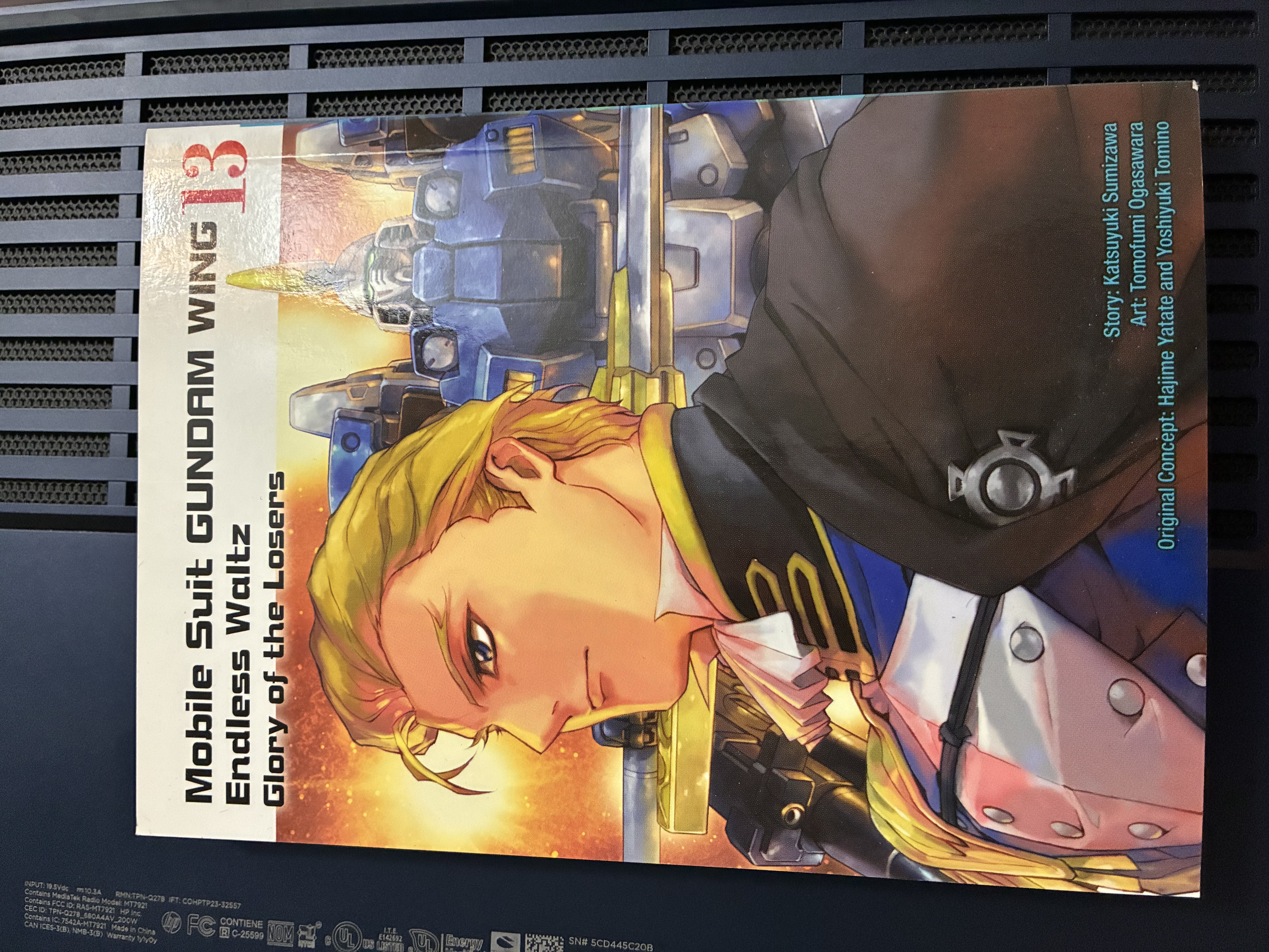 Front of Gundam Wing Endless Waltz: Glory of the Losers Volume 13 with the cover showing Treize and Tallgeese II.
